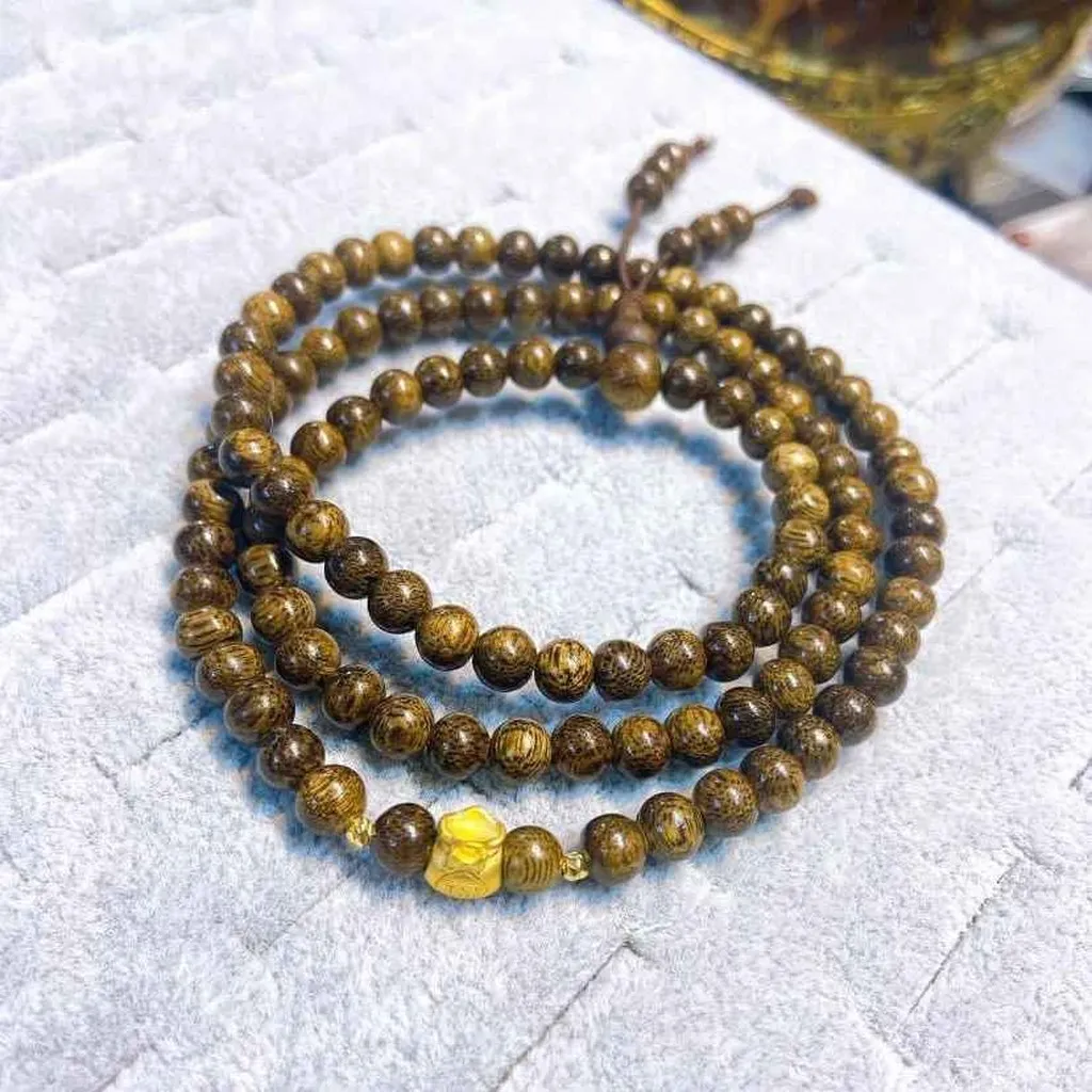 Vòng Tay Trầm Hương Tốc Mix Túi Tiền Tài Lộc Vàng Ta 24k - Thắng Giang