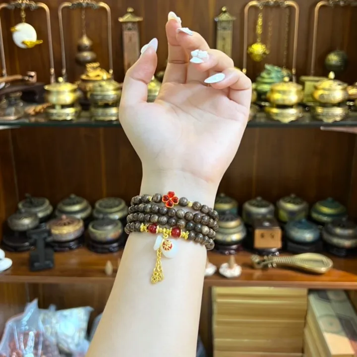 Vòng Tay Trầm Hương Tốc Thiên Nhiên Phối Cỏ Bốn Lá Túi Tiền Đá Phong Thuỷ - Thắng Giang