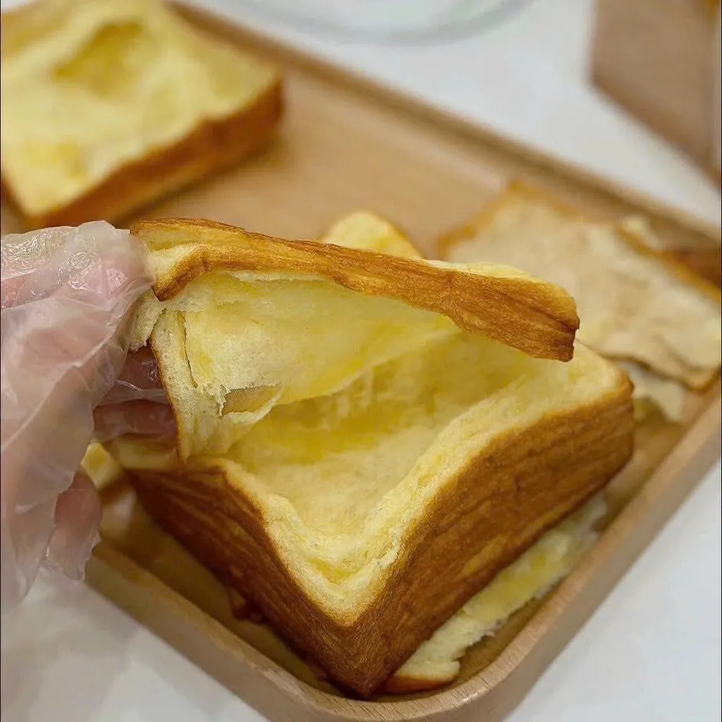 Alternative view of Thùng 2 Bánh Mì Gối Ngàn Lớp Bơ Sữa Siêu Ngon 210g/bánh - Có Tách Lẻ 1 Bánh - Minh Ngọc
