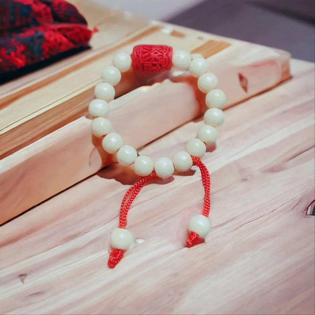 Vòng Tay Dâu Tằm Lu Thống Chu Sa Dành Cho Bé - Thắng Giang