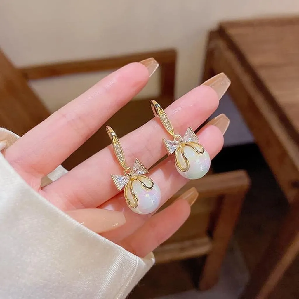 Bông Tai Nơ Bạc Ta Xi Vàng Gắn Trai San Hô Dáng Móc - Thắng Giang